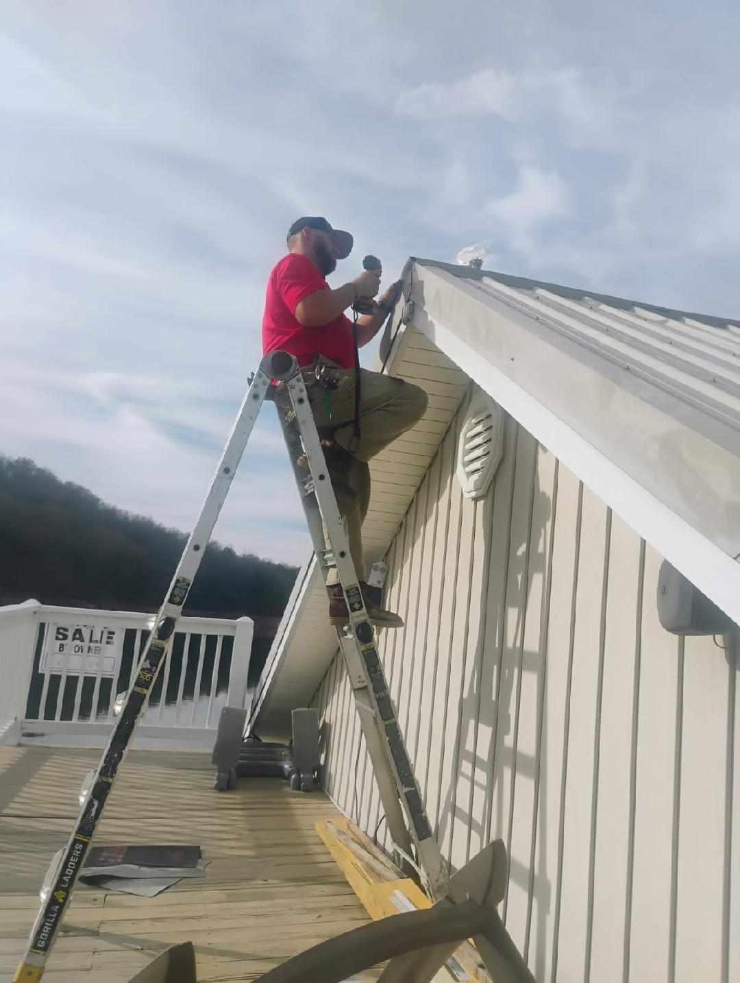 Critter Wranglers technician sealing wildlife entry points